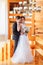 Pretty bride and stylish groom. Gorgeous wedding couple. Luxury dress