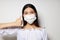 pretty brunette medical mask protection isolated background unaltered