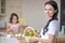 Pretty brunette woman holding easter basket in her hands