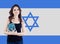 Pretty brunette woman student with Israel flag, study hebrew language concept