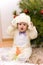 Pretty caucasian baby in rabbit costume
