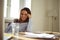 Pretty caucasian businesswoman at home office desk