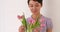 Pretty Chinese woman arranging tulips