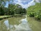 Pretty Clouds and C&O Canal Landscape With Reflection in Spring in May