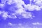 Pretty colorful blue cumulus cloudy sky for using in design as background.