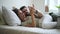 Pretty couple in bed talking and touching hands relaxed Spbd. girlfriend and boyfriend in hipster