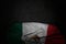 Pretty dark picture of Mexico flag with large folds on black stone with free space for your content - any holiday flag 3d
