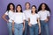 Pretty Diverse Women Standing Over Purple Studio Background