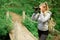 Pretty explorer woman with binoculars