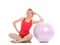 Pretty fitness woman exercise with pilates ball