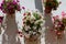 Pretty geraniums in pots against a whitewashed wall, Ronda, Spain.