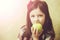 Pretty girl eating vitamin yellow apple