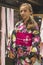 A pretty girl in a kimono. Kimono is the traditional dress worn popular in Japan.European girl in kimono