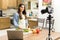Pretty girl making video for a food blog