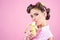 Pretty girl in vintage style. pin up woman with trendy makeup. pinup girl with fashion hair. banana dieting. retro woman