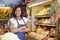 Pretty grocery store saleswoman