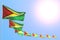 Pretty holiday flag 3d illustration - many Guyana flags placed diagonal with bokeh and empty place for text