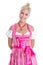 Pretty isolated young woman wearing bavarian dress called dirndl