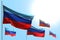 Pretty labor day flag 3d illustration - 5 flags of Luhansk Peoples Republic are waving against blue sky picture with soft focus