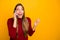 Pretty lady holding telephone hands tell friends new gossips wear knitted pullover isolated yellow background