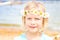 Pretty Little Blond Girl with a Crown of Daisies