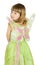 Pretty little girl in fairy costume on white background