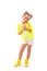 Pretty little girl in yellow shirt, white shorts and yellow boots