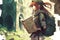 Pretty Manga girl with a large backpack and a map, exploring ancient ruins and uncovering hidden treasures illustration generative