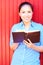 Pretty Mixed Race Woman Reading Holy Bible