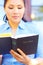 Pretty Mixed Race Woman Reading Holy Bible