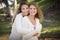 Pretty Mother and Daughter Portrait in Park