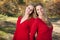 Pretty Mother and Daughter Portrait in Park