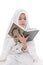 Pretty Muslim Girl Studying Holy Book of Quran