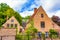 Pretty old canalside houses Bruges city view at summer day Belgium