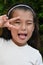 Pretty Philippina Girl Making Funny Faces Closeup