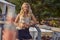 Pretty relaxed blond woman enjoying a tropical cocktail on summer vacation