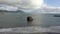 Pretty sea stack and mountain at Oregon Coast, drone forward