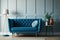 Pretty simple decor of living room with blue sofa and light