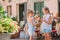 Pretty smiling little girls with shopping bags