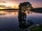 Pretty sunrise waterscape with low clouds