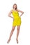Pretty tall woman in short yellow dress isolated