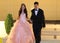 Pretty teen quinceanera birthday girl celebrating in princess dress pink party, special celebration of girl becoming woman.