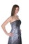 Pretty teenage girl in gray strapless formal gown