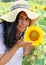 Pretty Turkish Woman  with hat posing with sunflower