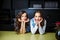 Pretty twins young women together in a kitchen room, casual style