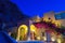 Pretty vacation villa at dawn in Kamari village Santorini Greece