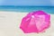 Pretty vibrant pink beach umbrella