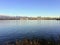 A pretty view looking across the calm waters of English Bay at the beautiful skyline of downtown Vancouver,