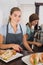 Pretty waitresses working with a smile