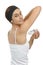 Pretty woman with antiperspirant deodorant, on white